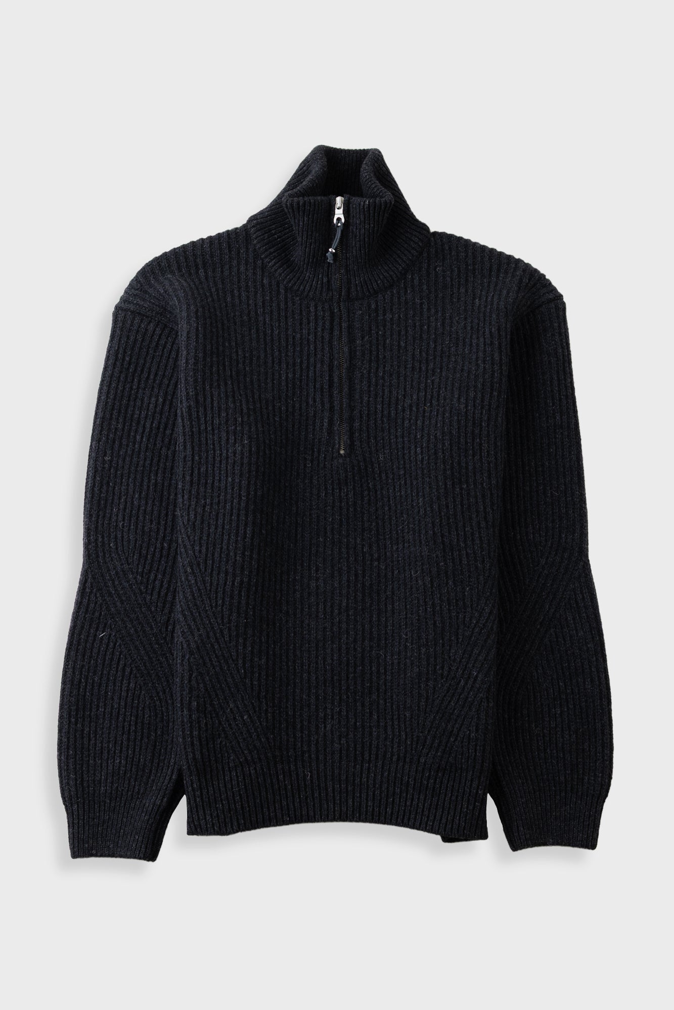 A dark navy ribbed knit quarter-zip sweater with a mock neck collar, displayed on a light gray background.