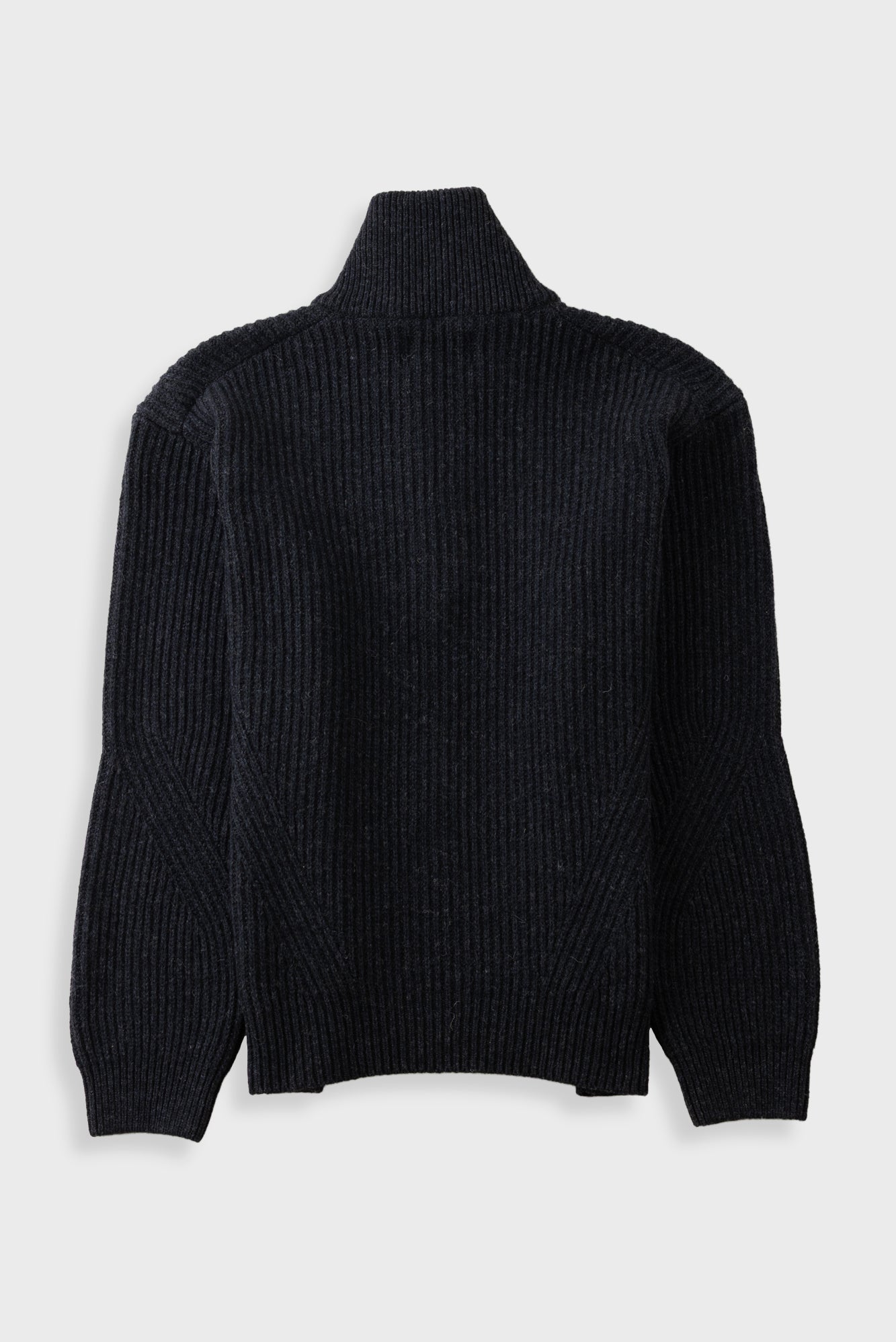 A black ribbed knit turtleneck sweater shown from the back, displayed on a light gray background.