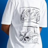 A man wearing a white short-sleeve t-shirt with a black line art graphic print on the front, set against a solid blue background.