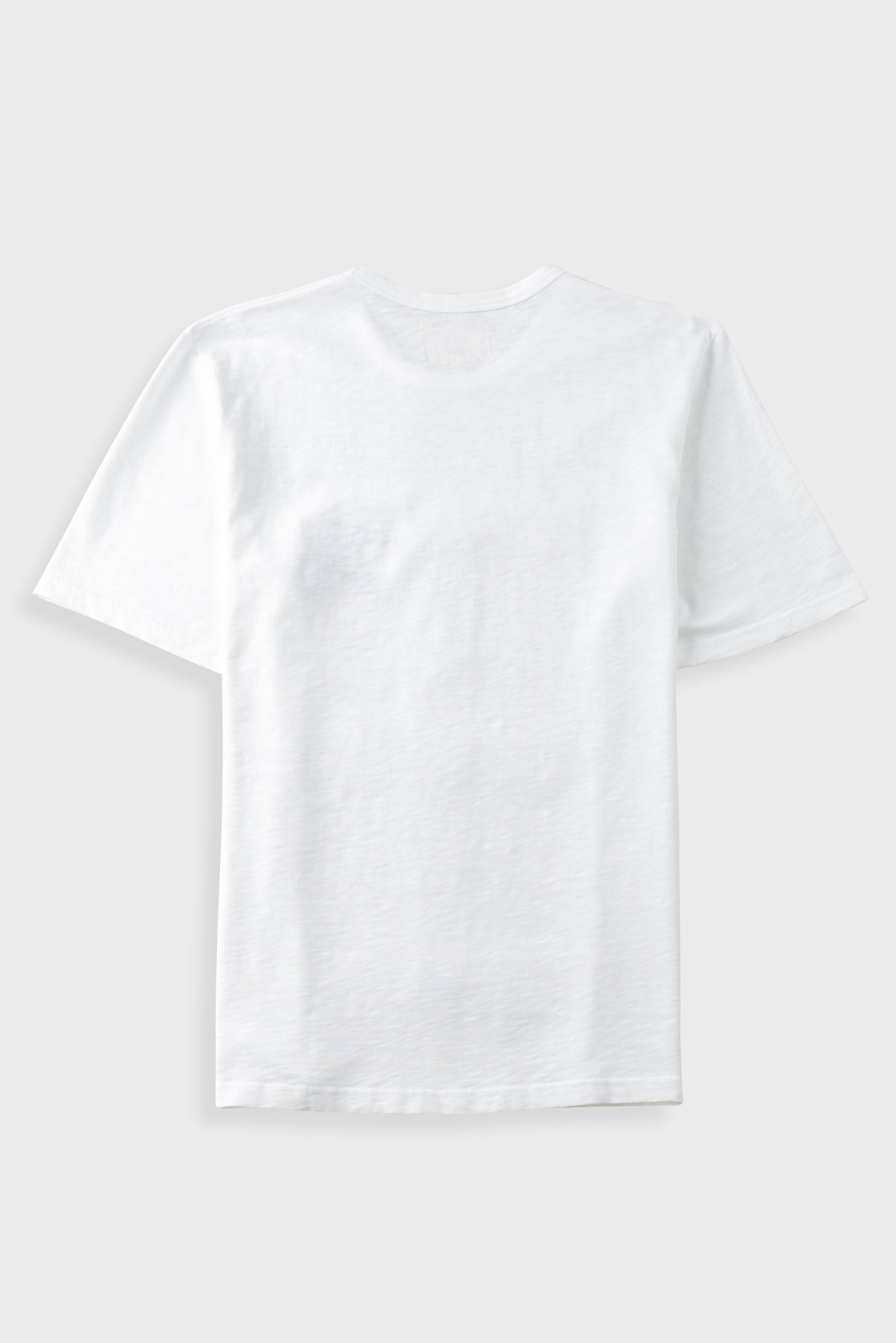 A plain white short-sleeve crewneck t-shirt laid flat against a light gray background.