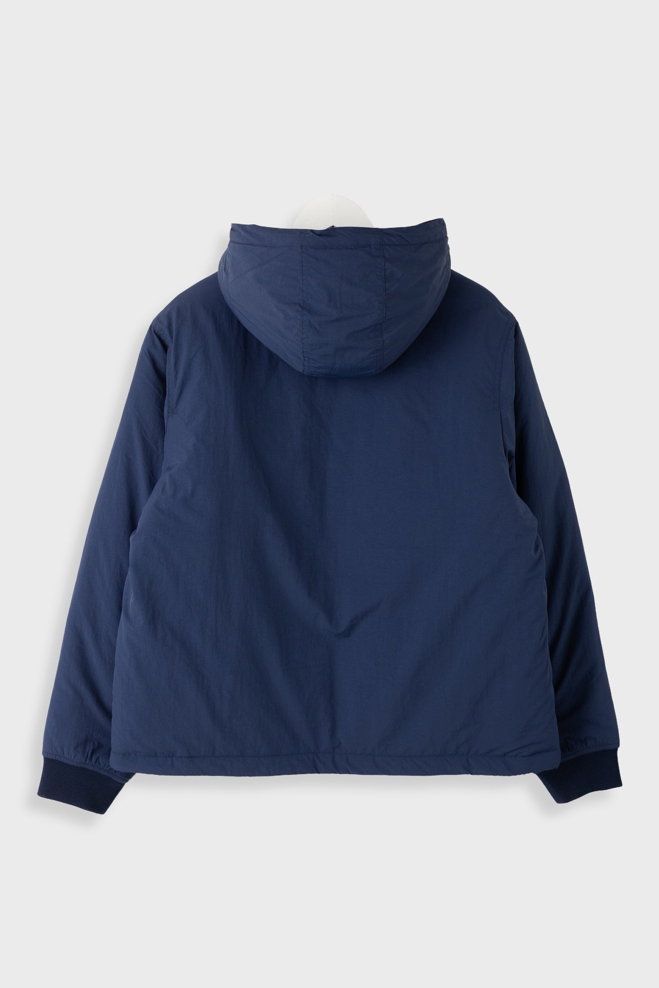 A navy blue hooded jacket shown from the back, laid flat against a light gray background.
