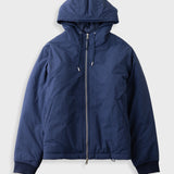 A navy blue hooded puffer jacket with a full front zipper, shown flat against a light gray background.
