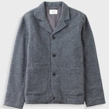 A gray textured wool-blend jacket with notch lapels, three front buttons, and two large front patch pockets, shown flat against a light gray background.