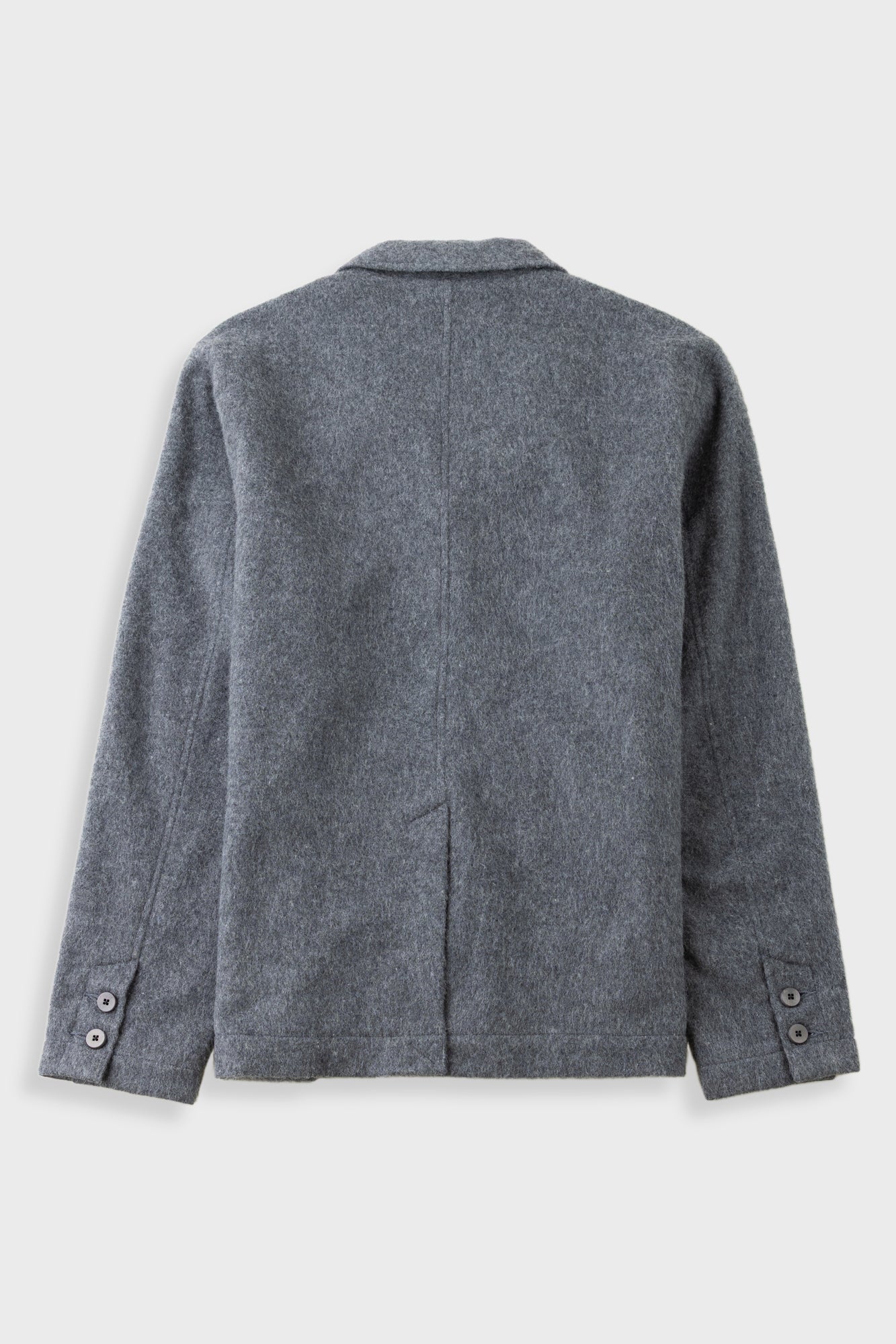 A gray textured wool-blend jacket shown from the back, featuring a classic collar, long sleeves with buttoned cuffs, and a central seam running down the back, photographed on a light gray background.